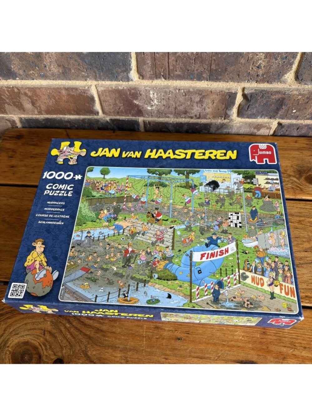 2016 Jan van Haasteren 19064 – Mudracers – 1000 Piece Puzzle